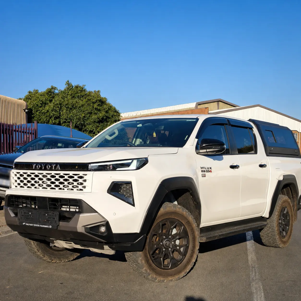 White Toyota Hilux Travo customer vehicle