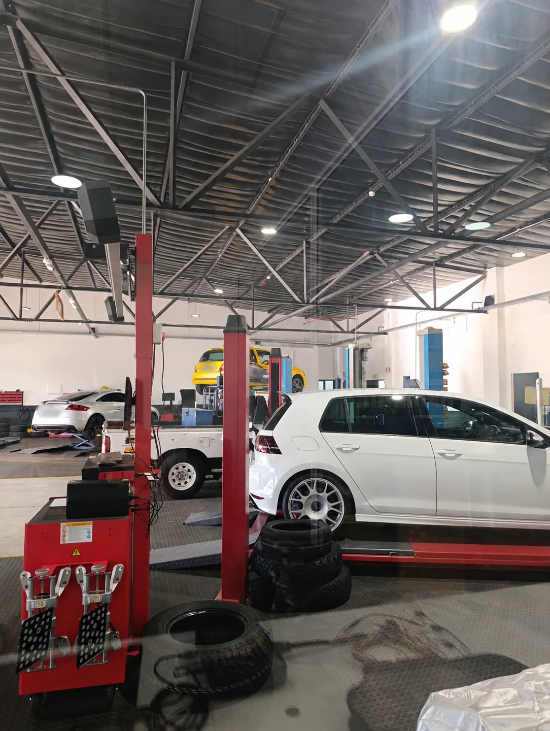 White Volkswagen Golf inside the Cape Town partner workshop
