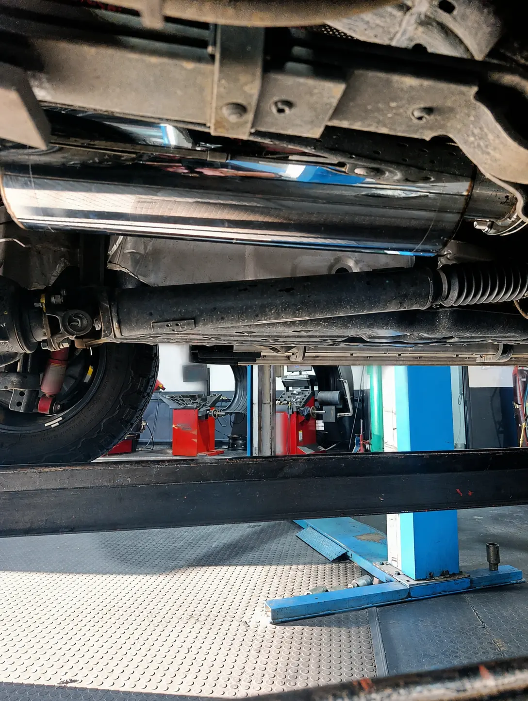 Performance exhaust system fitted beneath a bakkie